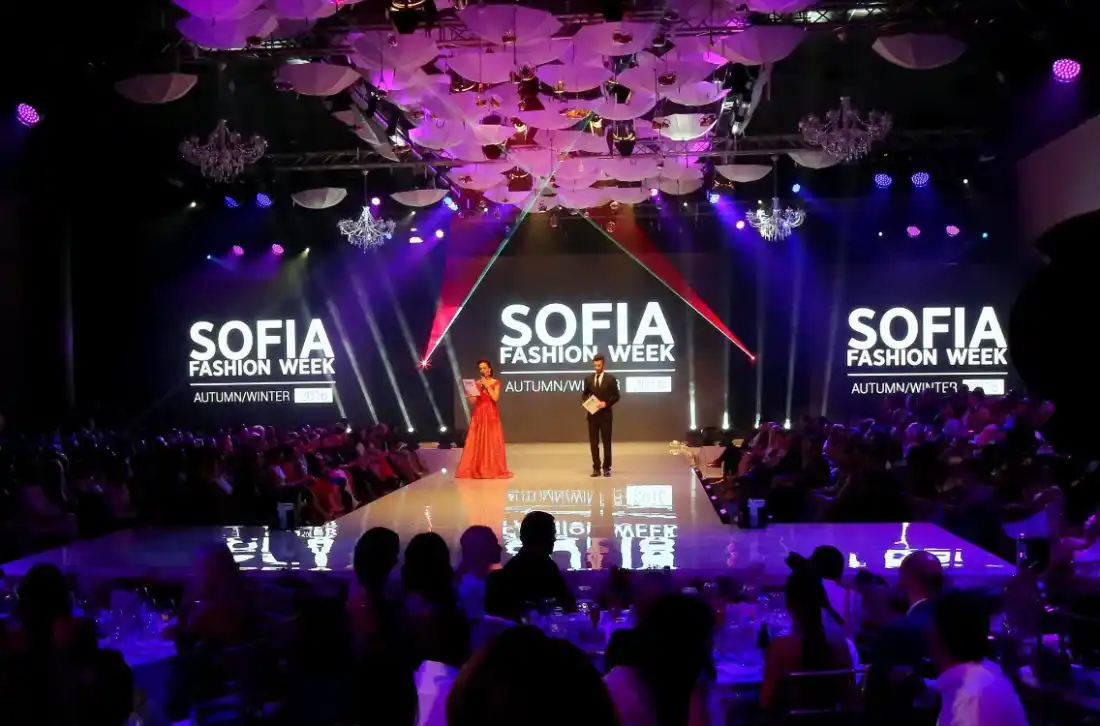 The Sofia Fashion Week runway with LED screens and laser beams, the presenters on stage